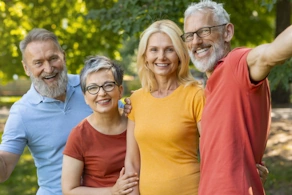Life Assure Group Of Seniors Outisde In Park Hero